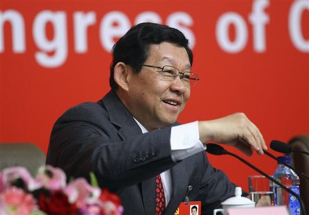 Chen Deming, China's Minister of Commerce, takes questions during an interview at the press center of the 18th National Congress of the Comm Chen Deming, China's Minister of Commerce, takes questions during an interview at the press center of the 18th National Congress of the Comm