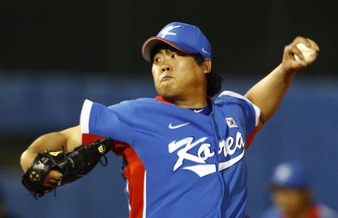 South Korea starting pitcher Ryu Hyun-jin pitches to Taiwan in the baseball final at the 16th Asian Games in Guangzhou, Guangdong province, South Korea starting pitcher Ryu Hyun-jin pitches to Taiwan in the baseball final at the 16th Asian Games in Guangzhou, Guangdong province,