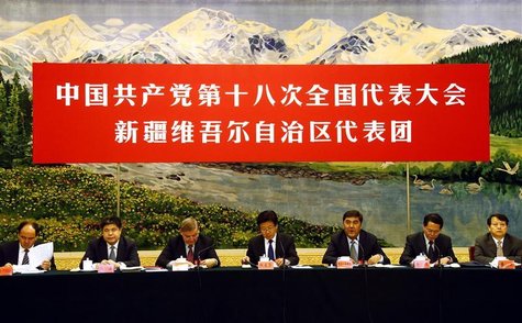 Members of the Xinjiang provincial delegation and representatives from the National People's Congress (NPC) attend a meeting in the Xinjiang Members of the Xinjiang provincial delegation and representatives from the National People's Congress (NPC) attend a meeting in the Xinjiang