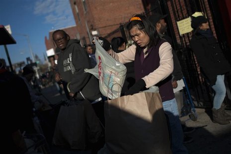 Residents displaced by Hurricane Sandy wait in a line for food and clothing distribution in the Brooklyn Borough of New York, November 9, 20 Residents displaced by Hurricane Sandy wait in a line for food and clothing distribution in the Brooklyn Borough of New York, November 9, 20