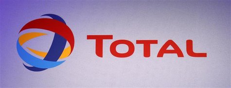 The logo of French oil company Total is seen during the company's 2011 annual result presentation in Paris February 10, 2012. REUTERS/Jacky The logo of French oil company Total is seen during the company's 2011 annual result presentation in Paris February 10, 2012. REUTERS/Jacky