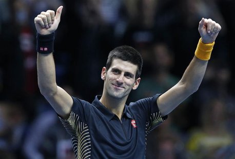 Serbia's Novak Djokovic celebrates his win against Argentina's Juan Martin Del Potro after their men's singles semifinal tennis match at the Serbia's Novak Djokovic celebrates his win against Argentina's Juan Martin Del Potro after their men's singles semifinal tennis match at the