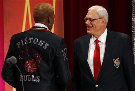 Inductee Dennis Rodman (L) and his presenter Hall of Fame Coach Phil Jackson take the stage during the Naismith Memorial Basketball Hall of Inductee Dennis Rodman (L) and his presenter Hall of Fame Coach Phil Jackson take the stage during the Naismith Memorial Basketball Hall of