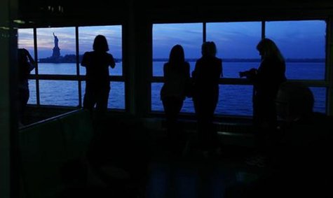 Commuters ride the Staten Island ferry in New York November 11, 2012. REUTERS/Carlo Allegri Commuters ride the Staten Island ferry in New York November 11, 2012. REUTERS/Carlo Allegri