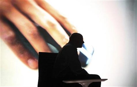 Microsoft CEO Steve Ballmer is silhouetted against a video screen during his presentation of the new Surface in Los Angeles, California, Jun Microsoft CEO Steve Ballmer is silhouetted against a video screen during his presentation of the new Surface in Los Angeles, California, Jun