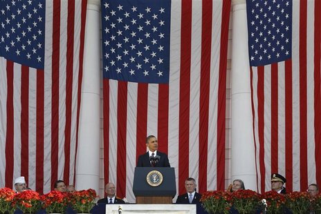 U.S. President Barack Obama stands for Veterans Day remarks at Arlington National Cemetery in Arlington, Virginia, November 11, 2012. REUTER U.S. President Barack Obama stands for Veterans Day remarks at Arlington National Cemetery in Arlington, Virginia, November 11, 2012. REUTER