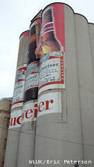 Depictions of beer bottles are removed from silos in Manitowoc, Nov. 8, 2012. (courtesy of FOX 11). Depictions of beer bottles are removed from silos in Manitowoc, Nov. 8, 2012. (courtesy of FOX 11).