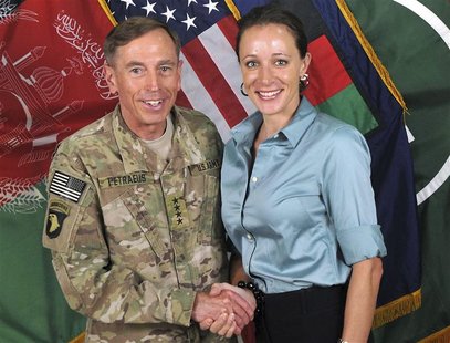 Commander of the International Security Assistance Force/U.S. Forces in Afghanistan General David Petraeus shakes hands with author Paula Br Commander of the International Security Assistance Force/U.S. Forces in Afghanistan General David Petraeus shakes hands with author Paula Br