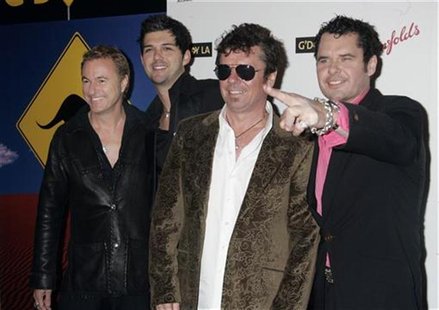 Australian band INXS poses at the Penfolds Icon Gala Dinner during G' Day LA Australia Week 2006 in Hollywood January 14, 2006. REUTERS/Fred Australian band INXS poses at the Penfolds Icon Gala Dinner during G' Day LA Australia Week 2006 in Hollywood January 14, 2006. REUTERS/Fred