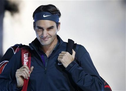 Switzerland's Roger Federer arrives for his final tennis match at the ATP World Tour Finals against Serbia's Novak Djokovic at the O2 Arena Switzerland's Roger Federer arrives for his final tennis match at the ATP World Tour Finals against Serbia's Novak Djokovic at the O2 Arena
