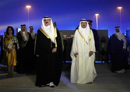 Bahrain's King Hamad bin Isa al-Khalifa (L) and Prime Minister Prince Khalifa bin Salman al-Khalifa arrive at the inauguration ceremony of t Bahrain's King Hamad bin Isa al-Khalifa (L) and Prime Minister Prince Khalifa bin Salman al-Khalifa arrive at the inauguration ceremony of t