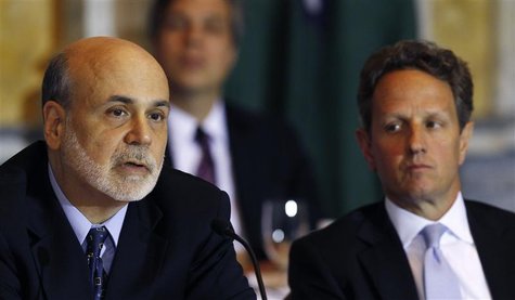 U.S. Secretary of the Treasury Timothy Geithner (R) listens to Federal Reserve Chairman Ben Bernanke (L) at the Treasury Department for the U.S. Secretary of the Treasury Timothy Geithner (R) listens to Federal Reserve Chairman Ben Bernanke (L) at the Treasury Department for the