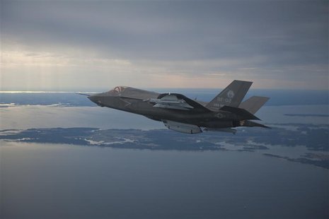 The U.S. Marine Corps version of Lockheed Martin's F35 Joint Strike Fighter, F-35B test aircraft BF-2 flies with external weapons for the fi The U.S. Marine Corps version of Lockheed Martin's F35 Joint Strike Fighter, F-35B test aircraft BF-2 flies with external weapons for the fi