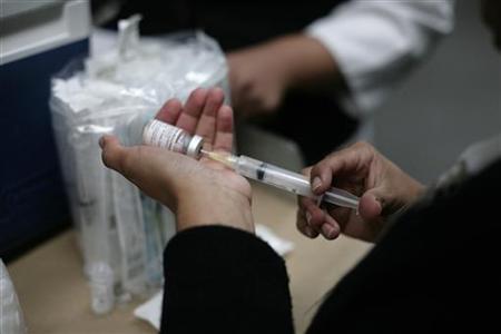 Health Department worker prepares Measles vaccine Health Department worker prepares Measles vaccine
