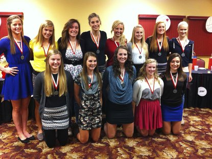 The 2012 Coldwater varsity volleyball team poses at the team banquet. The 2012 Coldwater varsity volleyball team poses at the team banquet.