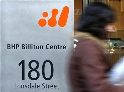 A pedestrian walks past the head offices of BHP Billiton in central Melbourne October 16, 2008. REUTERS/Mick Tsikas A pedestrian walks past the head offices of BHP Billiton in central Melbourne October 16, 2008. REUTERS/Mick Tsikas