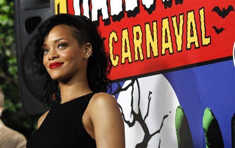 Singer Rihanna poses as she arrives at a reception in West Hollywood, California October 31, 2012. REUTERS/Mario Anzuoni Singer Rihanna poses as she arrives at a reception in West Hollywood, California October 31, 2012. REUTERS/Mario Anzuoni