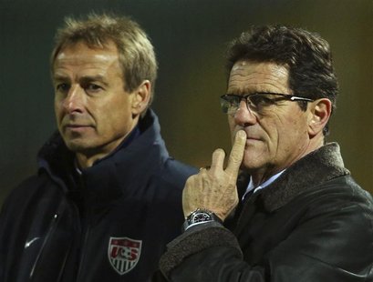 Russia coach Fabio Capello (R) and U.S. coach Jurgen Klinsmann watch their teams during their international friendly soccer match in Krasnod Russia coach Fabio Capello (R) and U.S. coach Jurgen Klinsmann watch their teams during their international friendly soccer match in Krasnod
