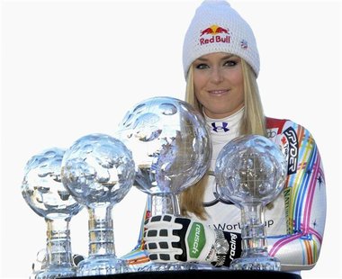 Lindsey Vonn from the U.S. poses with her trophies after winning the women's overall, downhill, super G and combined World Cup at the Alpine Lindsey Vonn from the U.S. poses with her trophies after winning the women's overall, downhill, super G and combined World Cup at the Alpine