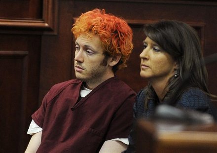 Colorado shooting suspect James Eagan Holmes (L) sits with public defender Tamara Brady during his first court appearance in Aurora, Colorad Colorado shooting suspect James Eagan Holmes (L) sits with public defender Tamara Brady during his first court appearance in Aurora, Colorad