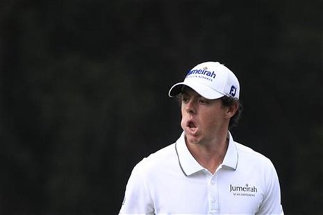 Rory McIlroy of Northern Ireland reacts after missing a putt on the thirteenth green during the first day of the Hong Kong Open golf tournam Rory McIlroy of Northern Ireland reacts after missing a putt on the thirteenth green during the first day of the Hong Kong Open golf tournam