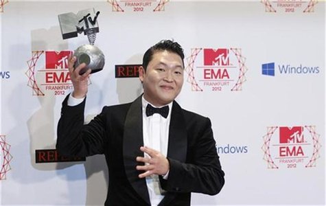 South Korean singer PSY poses with his Best Video award backstage during the MTV European Music Awards 2012 show at the Festhalle in Frankfu South Korean singer PSY poses with his Best Video award backstage during the MTV European Music Awards 2012 show at the Festhalle in Frankfu
