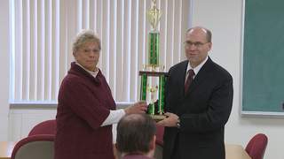 Pittsfield town clerk Jan Bodart and town chairman Keith Deneys with the Voter Challenge trophy, Thursday, November 15, 2012. (courtesy of FOX 11). Pittsfield town clerk Jan Bodart and town chairman Keith Deneys with the Voter Challenge trophy, Thursday, November 15, 2012. (courtesy of FOX 11).