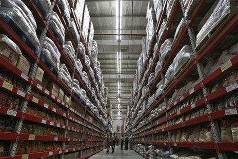 Workers walk inside an aisle of the newly opened Bharti Wal-Mart Best Price Modern wholesale store in the southern Indian city of Hyderabad Workers walk inside an aisle of the newly opened Bharti Wal-Mart Best Price Modern wholesale store in the southern Indian city of Hyderabad