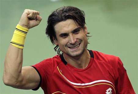 Spain's David Ferrer celebrates after winning over Czech Republic's Radek Stepanek during their Davis Cup tennis tournament final match in P Spain's David Ferrer celebrates after winning over Czech Republic's Radek Stepanek during their Davis Cup tennis tournament final match in P