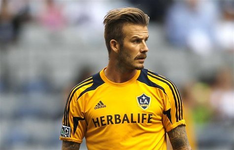 David Beckham of the L.A. Galaxy warms up before his team faces the Vancouver Whitecaps during their MLS soccer match in Vancouver, British David Beckham of the L.A. Galaxy warms up before his team faces the Vancouver Whitecaps during their MLS soccer match in Vancouver, British