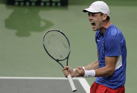 The Czech Republic's Tomas Berdych celebrates after winning over Spain's Nicolas Almagro during their Davis Cup tennis tournament final matc The Czech Republic's Tomas Berdych celebrates after winning over Spain's Nicolas Almagro during their Davis Cup tennis tournament final matc
