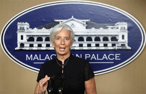 International Monetary Fund Managing Director Christine Lagarde gestures as she answers questions during a news briefing at the presidential International Monetary Fund Managing Director Christine Lagarde gestures as she answers questions during a news briefing at the presidential