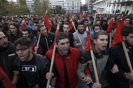 Greek students shout slogans during a rally marking the 39th anniversary of a 1973 student uprising against a U.S. backed dictatorship rulin Greek students shout slogans during a rally marking the 39th anniversary of a 1973 student uprising against a U.S. backed dictatorship rulin