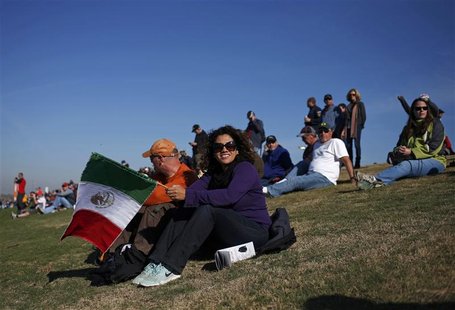 Fans of Sauber Formula One driver Sergio Perez of Mexico watch the third practice session of the U.S. F1 Grand Prix at the Circuit of the Am Fans of Sauber Formula One driver Sergio Perez of Mexico watch the third practice session of the U.S. F1 Grand Prix at the Circuit of the Am