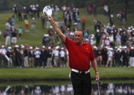 Miguel Angel Jimenez from Spain celebrates after winning the Hong Kong Open golf tournament November 18, 2012. REUTERS/Tyrone Siu Miguel Angel Jimenez from Spain celebrates after winning the Hong Kong Open golf tournament November 18, 2012. REUTERS/Tyrone Siu