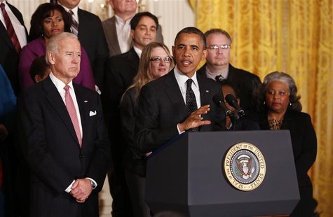 U.S. President Barack Obama delivers a statement on the U.S. "Fiscal Cliff" in the East Room of the White House as Vice President Joe Biden U.S. President Barack Obama delivers a statement on the U.S. "Fiscal Cliff" in the East Room of the White House as Vice President Joe Biden