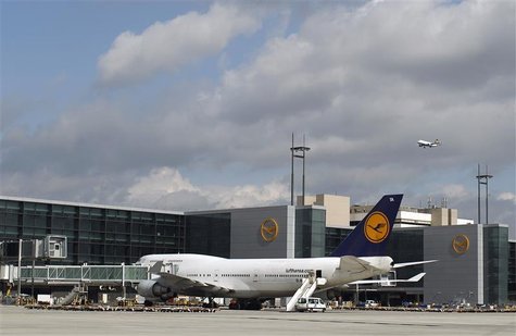 An aircraft of German air carrier Lufthansa stands in front of the newly built A-Plus terminal section at the Fraport airport during a guide An aircraft of German air carrier Lufthansa stands in front of the newly built A-Plus terminal section at the Fraport airport during a guide