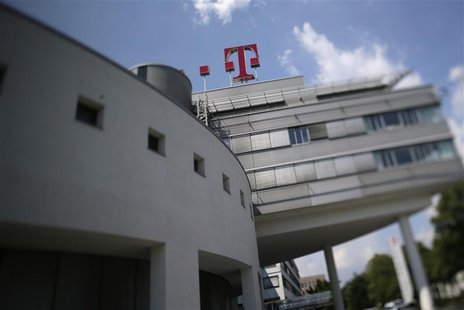 The logo of Deutsche Telekom AG is seen on top of the company's headquarter in Bonn May 24, 2012. REUTERS/Wolfgang Rattay The logo of Deutsche Telekom AG is seen on top of the company's headquarter in Bonn May 24, 2012. REUTERS/Wolfgang Rattay