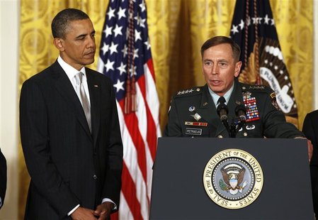 U.S. Army Gen. David Petraeus talks next to U.S. President Barack Obama at an event in the East Room of the White House in this April 28, 20 U.S. Army Gen. David Petraeus talks next to U.S. President Barack Obama at an event in the East Room of the White House in this April 28, 20
