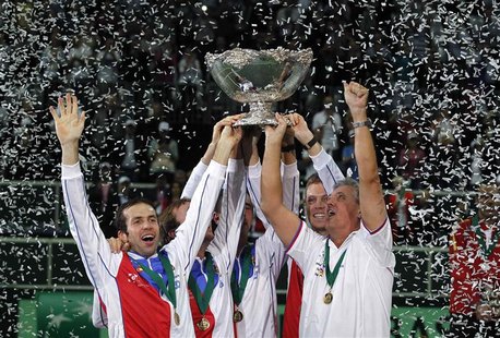 Czech Republic's team celebrates with the Davis Cup trophy after they defeated Spain in the final match in Prague November 18, 2012. REUTERS Czech Republic's team celebrates with the Davis Cup trophy after they defeated Spain in the final match in Prague November 18, 2012. REUTERS