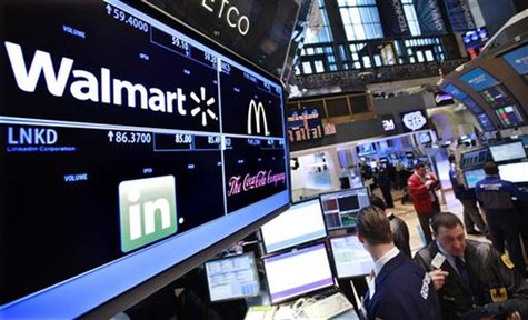 A board shows stock prices for Walmart at the booth they are traded on the floor of the New York Stock Exchange, March 6, 2012. REUTERS/Bren A board shows stock prices for Walmart at the booth they are traded on the floor of the New York Stock Exchange, March 6, 2012. REUTERS/Bren