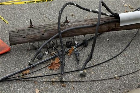 A fallen electric post belonging to the PSEG company is seen on a street in Union City, New Jersey, is this file photo taken November 2, 201 A fallen electric post belonging to the PSEG company is seen on a street in Union City, New Jersey, is this file photo taken November 2, 201