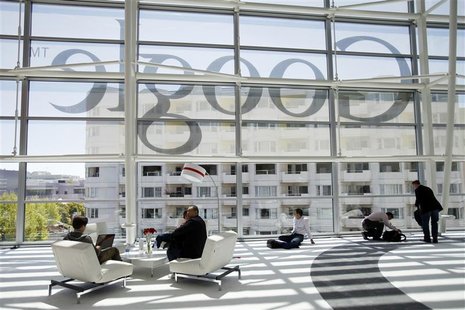 Attendees sits in front of a Google logo during Google I/O Conference at Moscone Center in San Francisco, California June 28, 2012. REUTERS/ Attendees sits in front of a Google logo during Google I/O Conference at Moscone Center in San Francisco, California June 28, 2012. REUTERS/