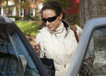 Paula Broadwell, the woman whose affair with CIA director David Petraeus led to his resignation, leaves her home in Charlotte, North Carolin Paula Broadwell, the woman whose affair with CIA director David Petraeus led to his resignation, leaves her home in Charlotte, North Carolin