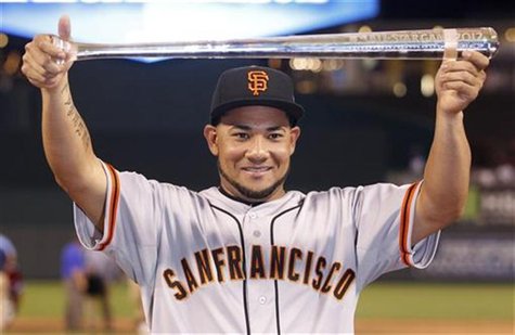 National League All-Star Melky Cabrera of the San Francisco Giants holds the MVP trophy after the National defeated the American League in M National League All-Star Melky Cabrera of the San Francisco Giants holds the MVP trophy after the National defeated the American League in M