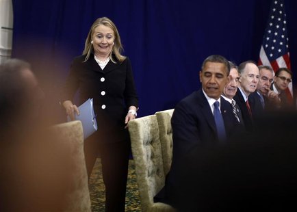 U.S. Secretary of State Hillary Clinton reacts as she arrives last for a meeting between President Barack Obama and Japan's Prime Minister Y U.S. Secretary of State Hillary Clinton reacts as she arrives last for a meeting between President Barack Obama and Japan's Prime Minister Y
