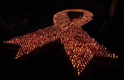 About 2880 candles are seen lit during a World AIDS Day event in Jakarta December 1, 2009. REUTERS/Dadang Tri About 2880 candles are seen lit during a World AIDS Day event in Jakarta December 1, 2009. REUTERS/Dadang Tri
