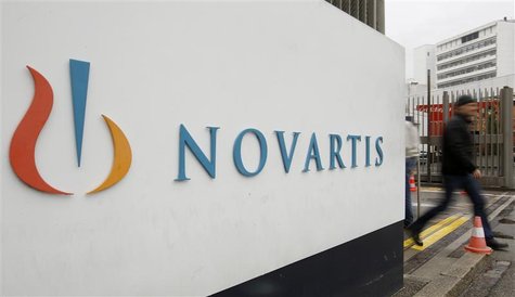A man walks past the logo of Swiss drugmaker Novartis AG in front of a plant in Basel October 25, 2011. REUTERS/Arnd Wiegmann A man walks past the logo of Swiss drugmaker Novartis AG in front of a plant in Basel October 25, 2011. REUTERS/Arnd Wiegmann