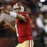 San Francisco 49ers quarterback Colin Kaepernick looks to pass against the Chicago Bears during the first quarter of their NFL football game San Francisco, California November 19, 2012. REUTERS/Beck Diefenbach
