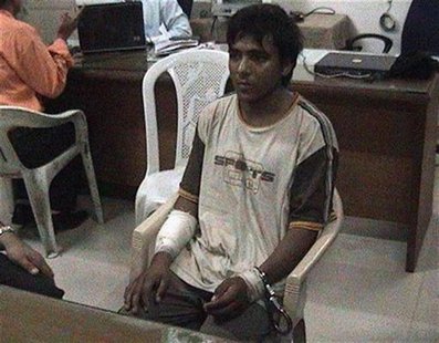 Mohammed Ajmal Kasab, the lone surviving member of the 10-man group which attacked several Mumbai landmarks, is seen at an undisclosed locat Mohammed Ajmal Kasab, the lone surviving member of the 10-man group which attacked several Mumbai landmarks, is seen at an undisclosed locat